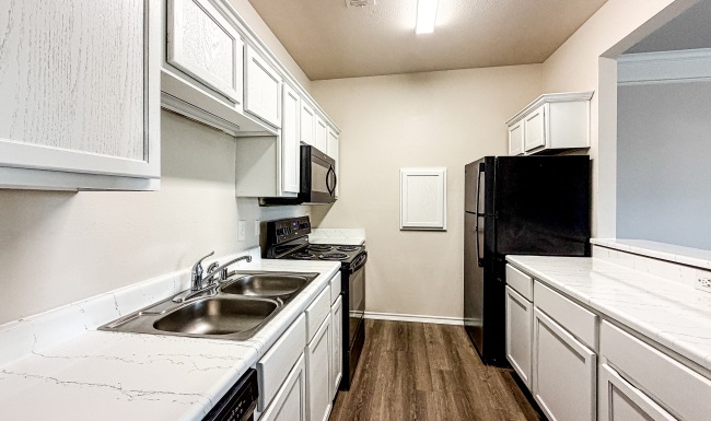 Kitchen with white cabinets