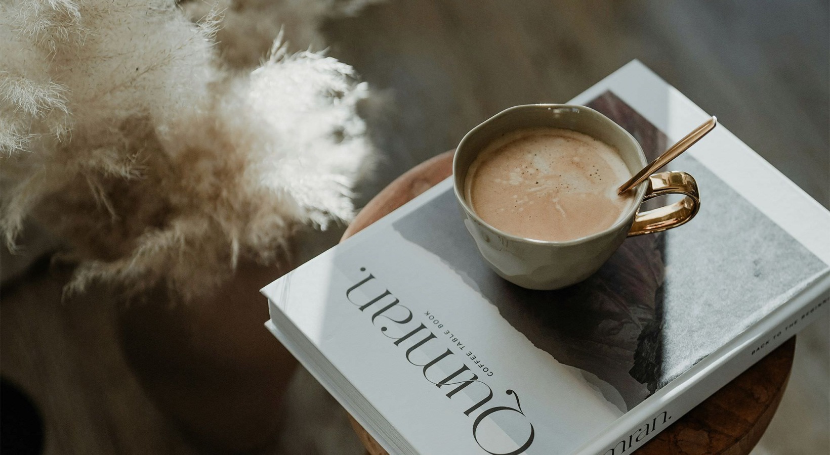 a cup of coffee on a book